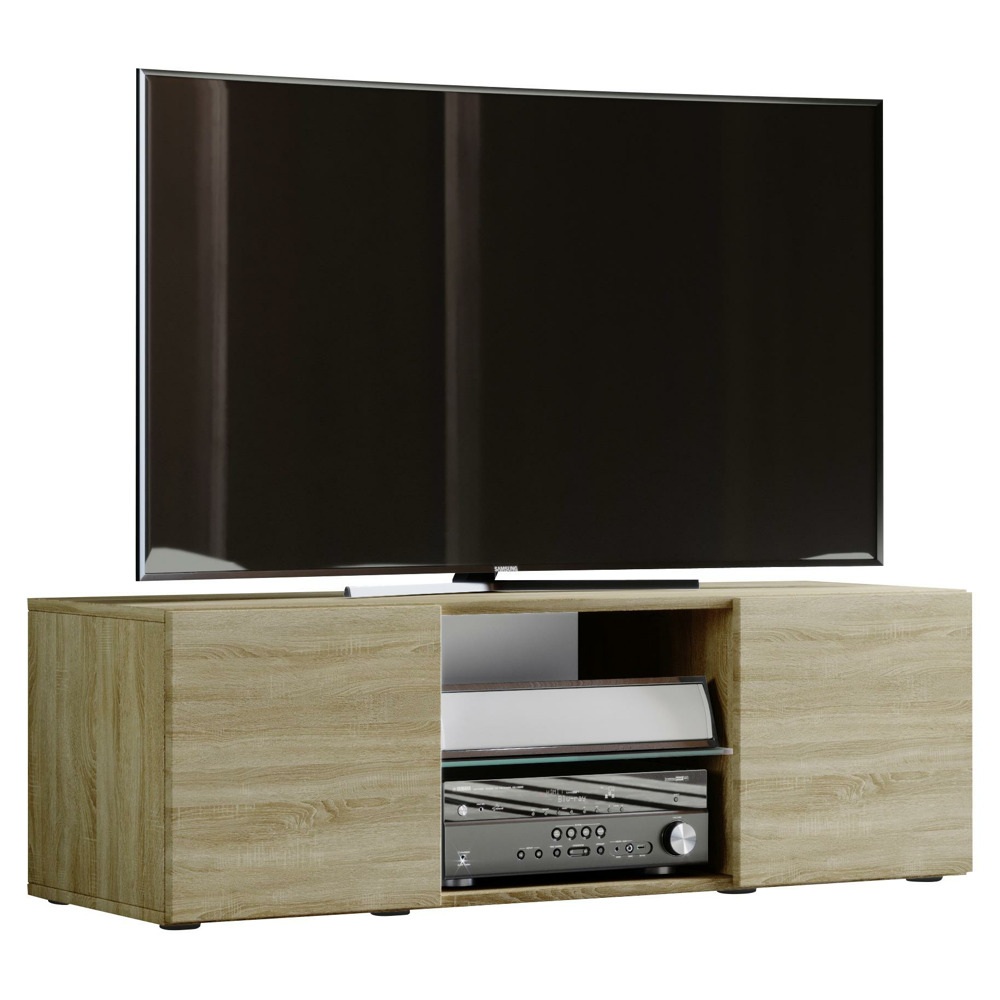 Toto zboží je k dispozici POUZE ONLINE. TV stolek LOWINA přináší jasné a harmonické tóny do vašeho obývacího pokoje. Korpus z dekoru dřeva v barvách dubu působí moderně a nadčasově. Zdrženlivý vzhled nábytku o rozměrech cca 115 x 40 x 36 cm (Š x V x H) je podpořen jasnými liniemi